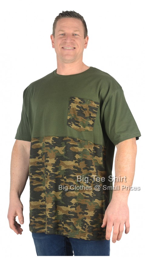 A man wearing a khaki coloured camo designed t shirt.