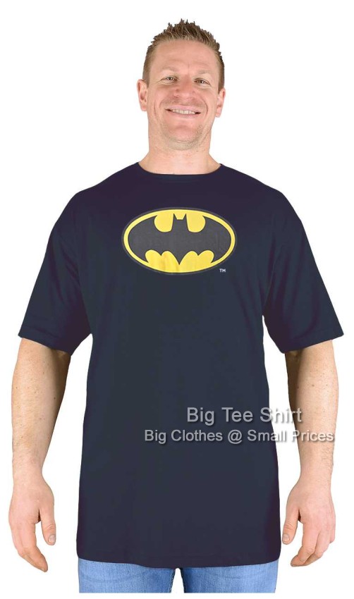A man wearing a Batman logo black t shirt