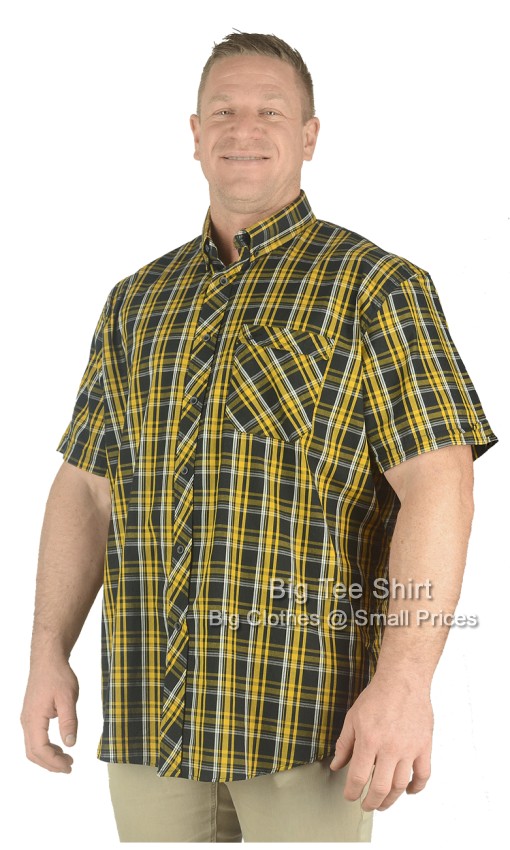 A man wearing a short sleeve check shirt.