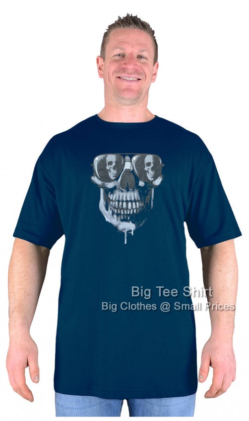A man wearing a navy blue t-shirt depicting a skull design.