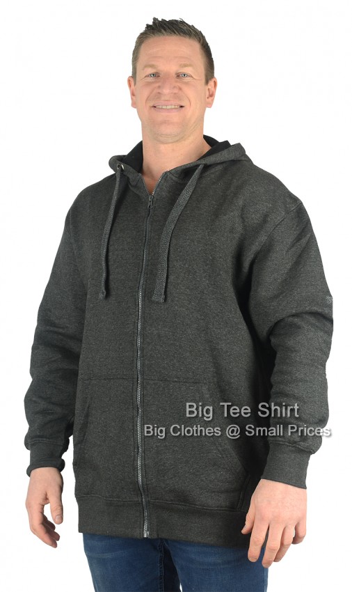 A man wearing a charcoal grey zip hoodie.