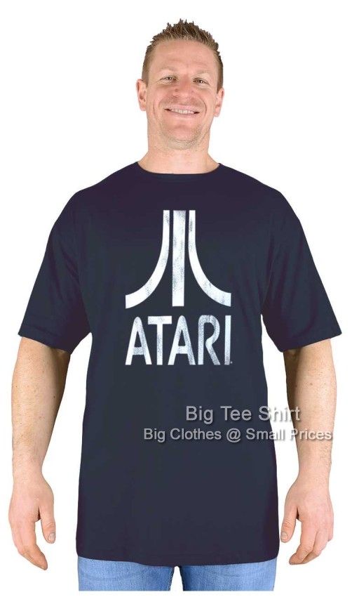 A man wearing a black t shirt with a Atari logo on it.